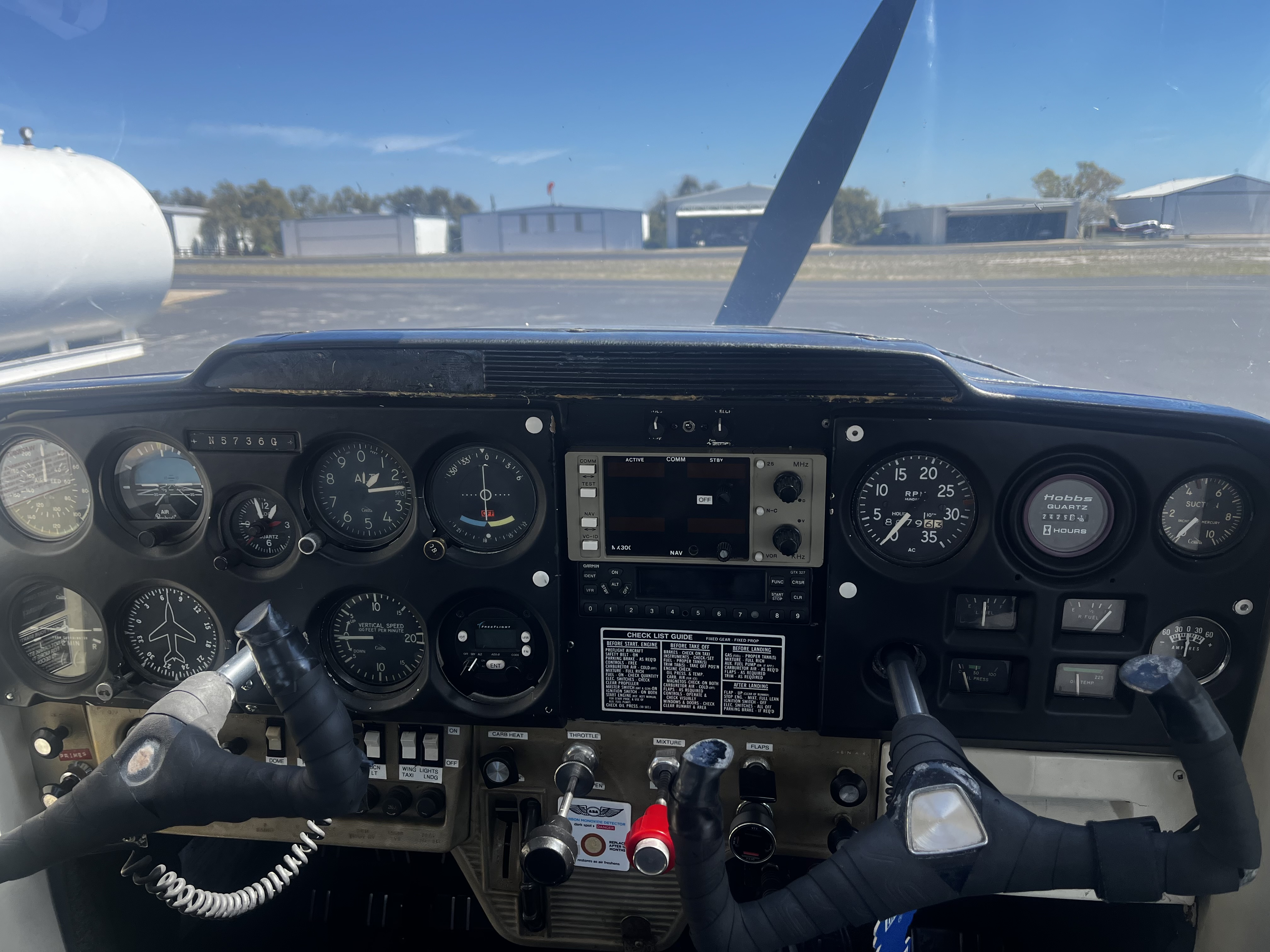 Cessna 150 cockpit view over the Texas Hill Country